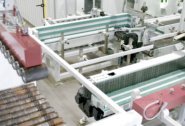 Transfer of the pipe couplings from the container using a flexible magnetic gripper and placement in rows on the loading portal